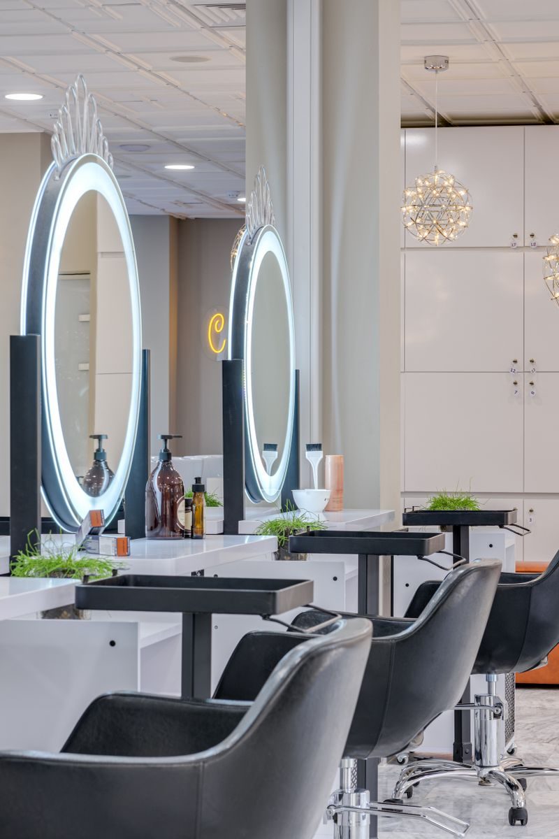 Bright modern salon interior with styling chairs ready for clients